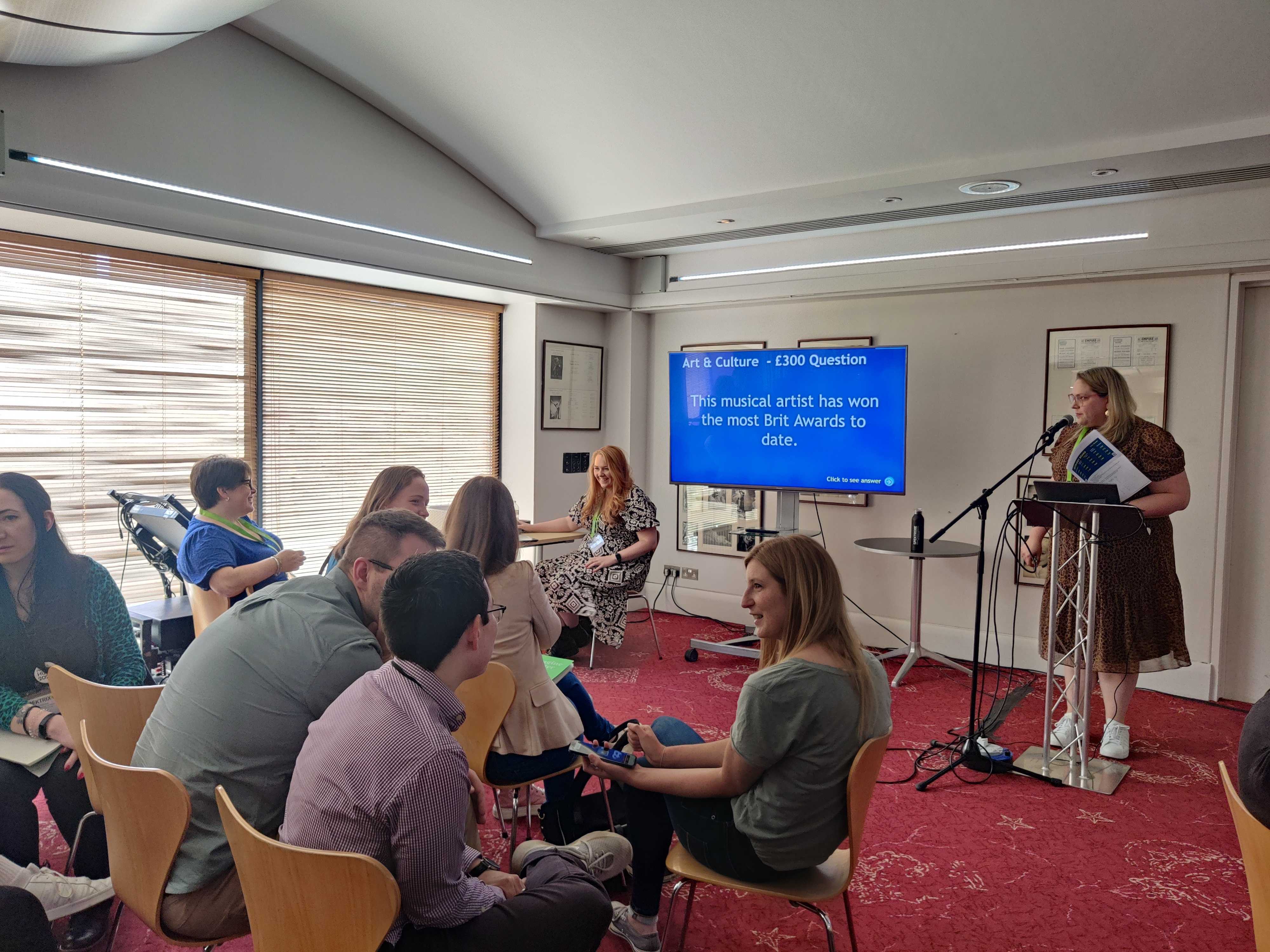 Bethany Nothstein hosts jeopardy at Spektrix Hubs 2023 in Edinburgh.