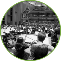 View from the back of the orchestra at Sacramento Philharmonic, looking out at a full auditorium